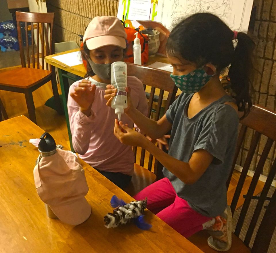 KBPZe_tQ Educational Explorations, two children are working on a project