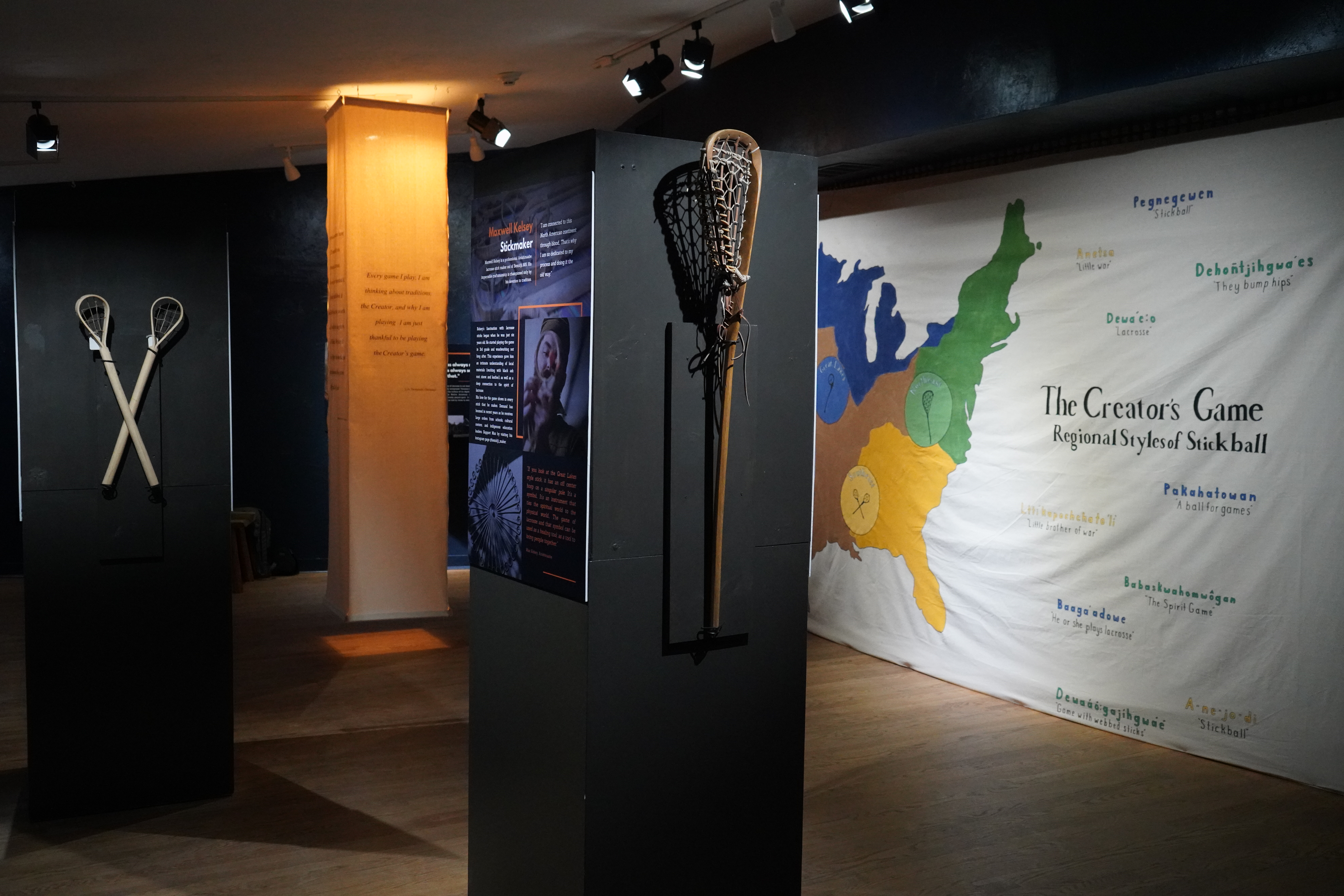 Creators Game Exhibit Photo of Creators Game Exhibit Lacrosse stick and exhibit signs