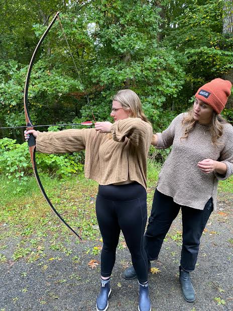picture of woman practicing archery